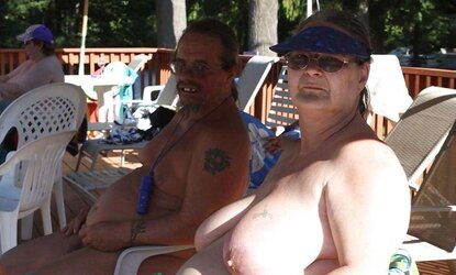 Older femmes sunbathing trio.