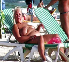 Older femmes sunbathing trio.
