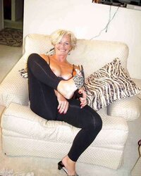 beautiful Platinum-Blonde Mature Justine Posing by DarKKo