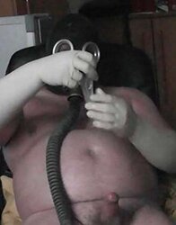 Masturbating in Gasmask