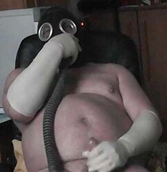 Masturbating in Gasmask