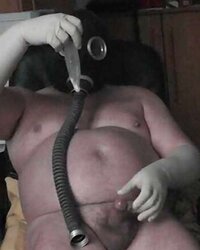 Masturbating in Gasmask