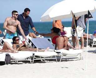 Kiara Mia In A Crimson Swimsuit in South Beach