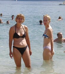 Mom and not her daughter in bathing suit