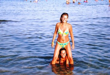 Mom and not her daughter in bathing suit