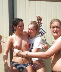 Femmes fooling around and showcasing knockers in a park