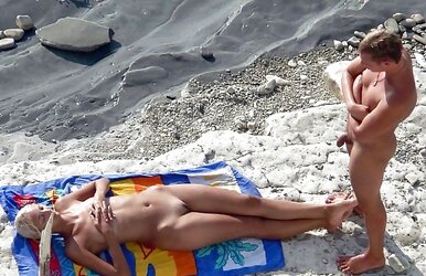 Naturist beach swingers