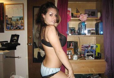 TEENAGER WITH GIGANTIC BRA-STUFFERS POSES