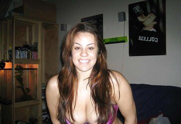 TEENAGER WITH GIGANTIC BRA-STUFFERS POSES