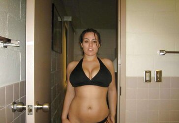 TEENAGER WITH GIGANTIC BRA-STUFFERS POSES