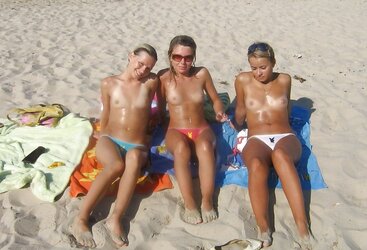 trio teenagers on the beach