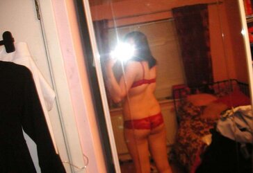 Teenager posing on the mirror