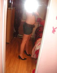 Teenager posing on the mirror