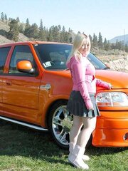 Chubby blondie posing in the mountains