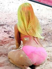 Nicki Minaj wears a pinkish bikin