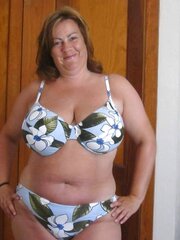 Big-Boobed mature amatuer posing in bathing suit