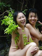 Asian gals at waterfall.