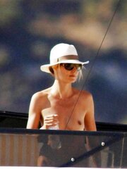 Heidi Klum Fresh Stripped To The Waist Sunbathing on a Yacht